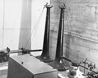 The horizontal pendulum north-south and east-west in the 1935 Seismograph Room. Photo: UAF Rasmuson Library Archives