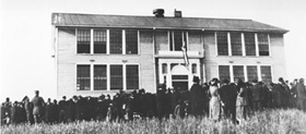 Fairbanks residents gathered on College Hill to hear Governor Scott C. Bone dedicate the new college on Sept. 13, 1922. Photo: University of Alaska Archives