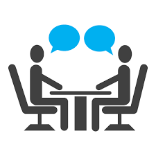 graphic of two people speaking at desk