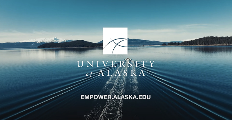 Empower Alaska with University of Alaska logo over ocean water