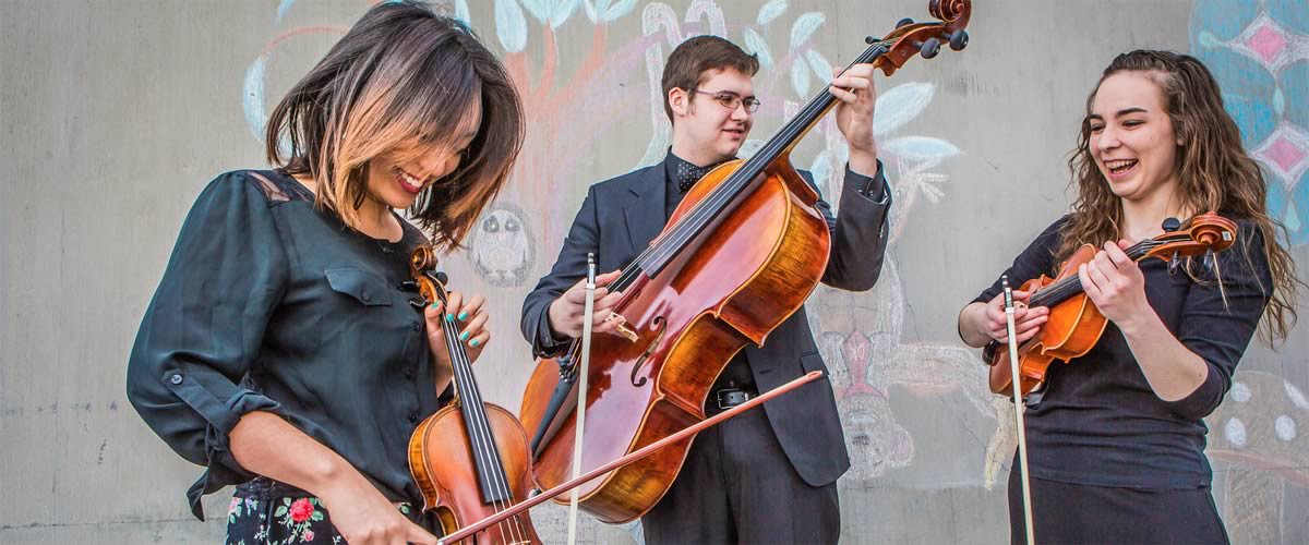 UAF music students with their string instruments