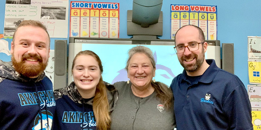 An ASMP mentor group photo with three teachers in an elementary classroom