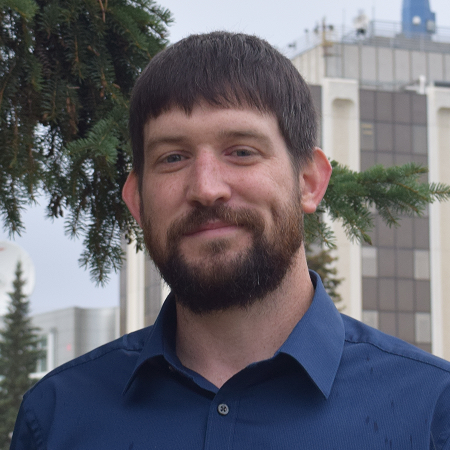 Adam Chisom, Program Administrator