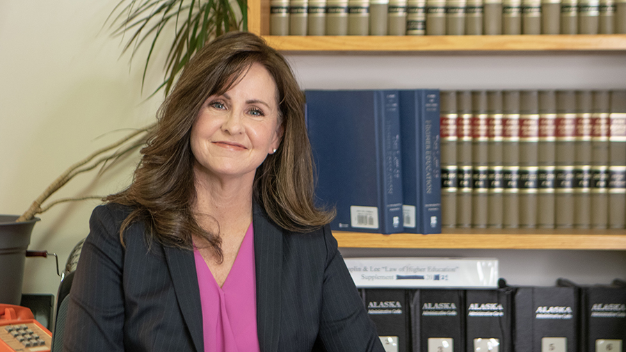 Mary Gower portrait in front of law books