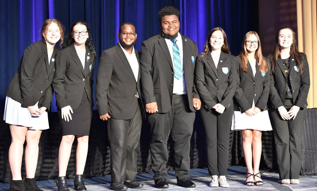 Torrey stands with fellow national officers