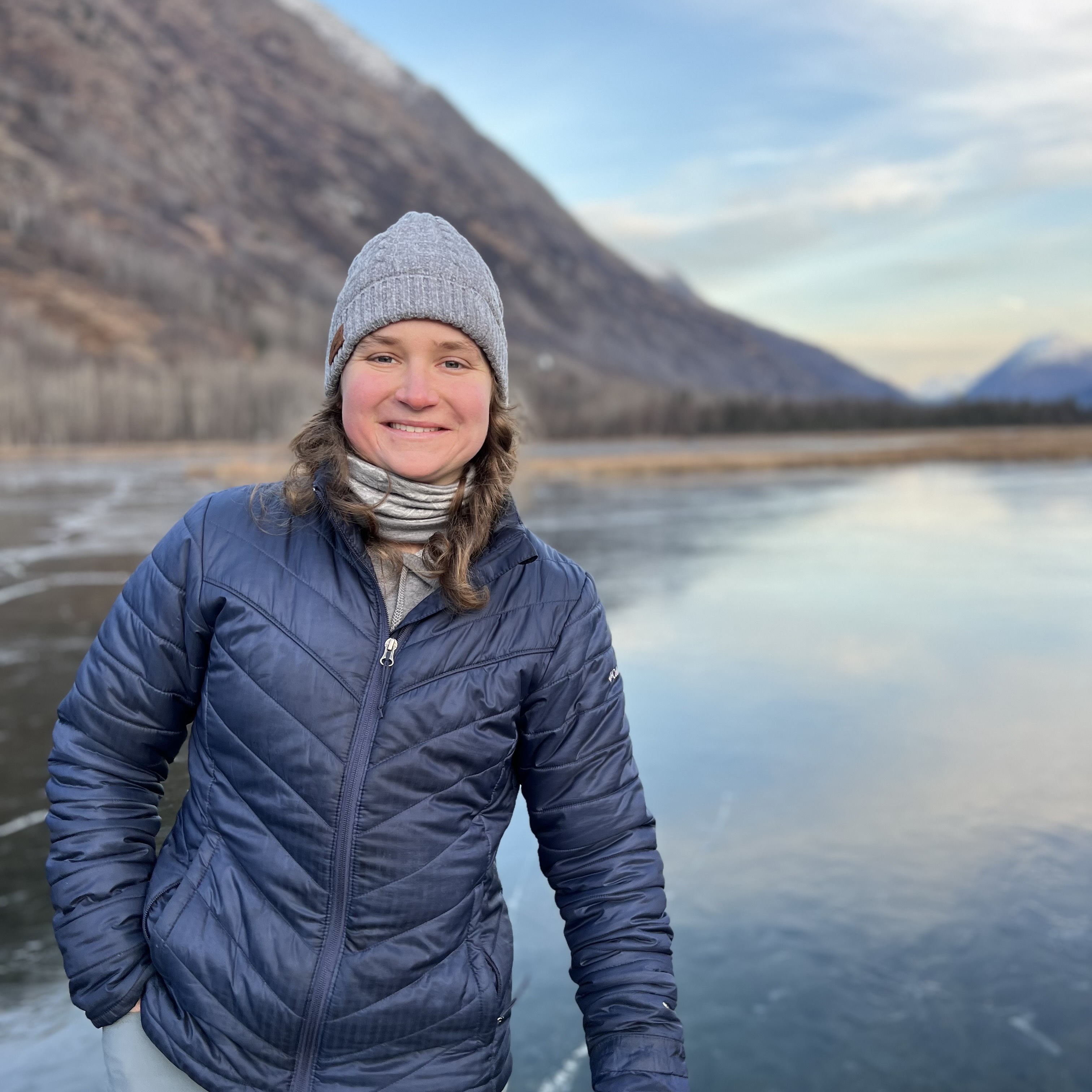 Annette Jarosz on a frozen mountain lake