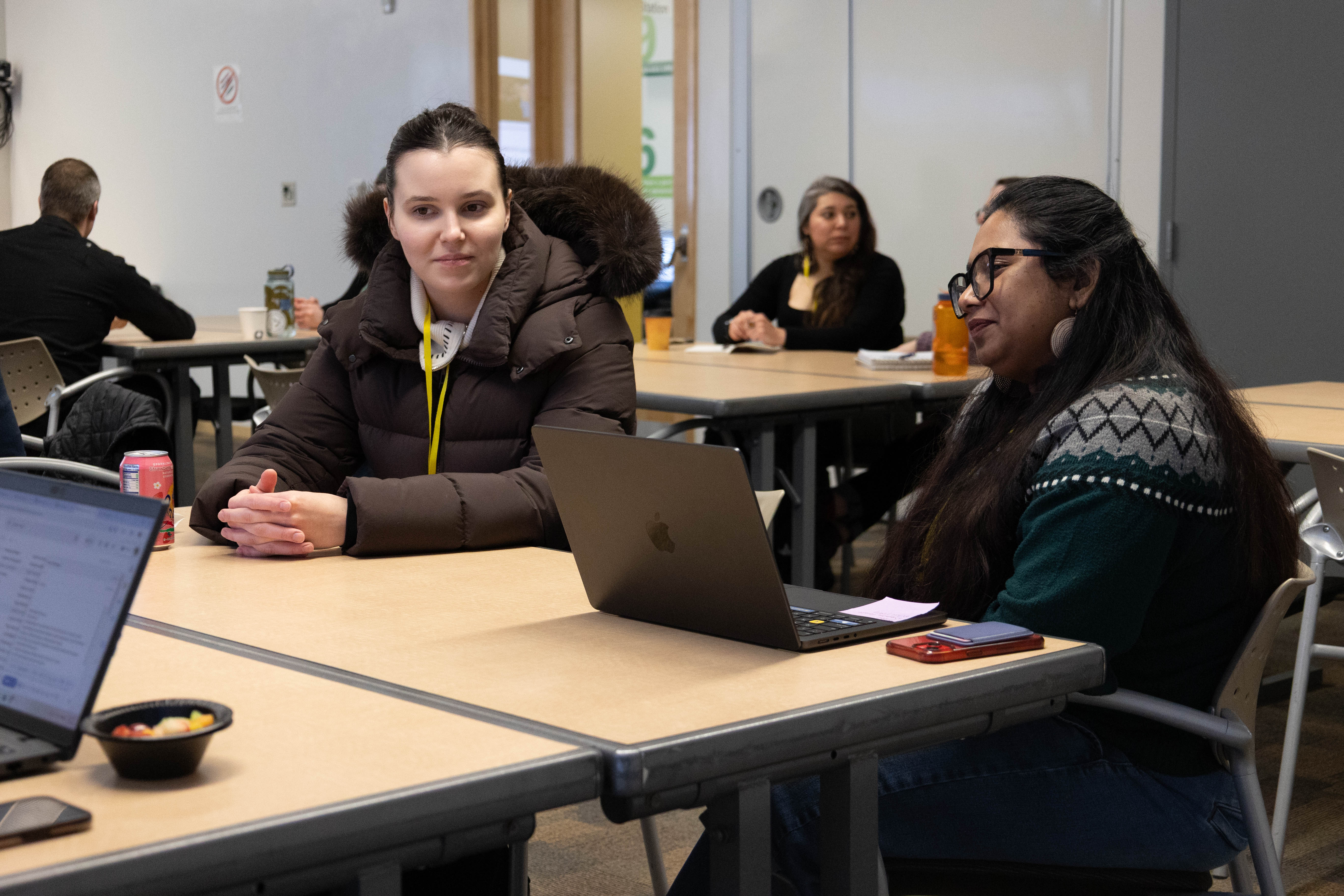 Students having a discussion during a session.