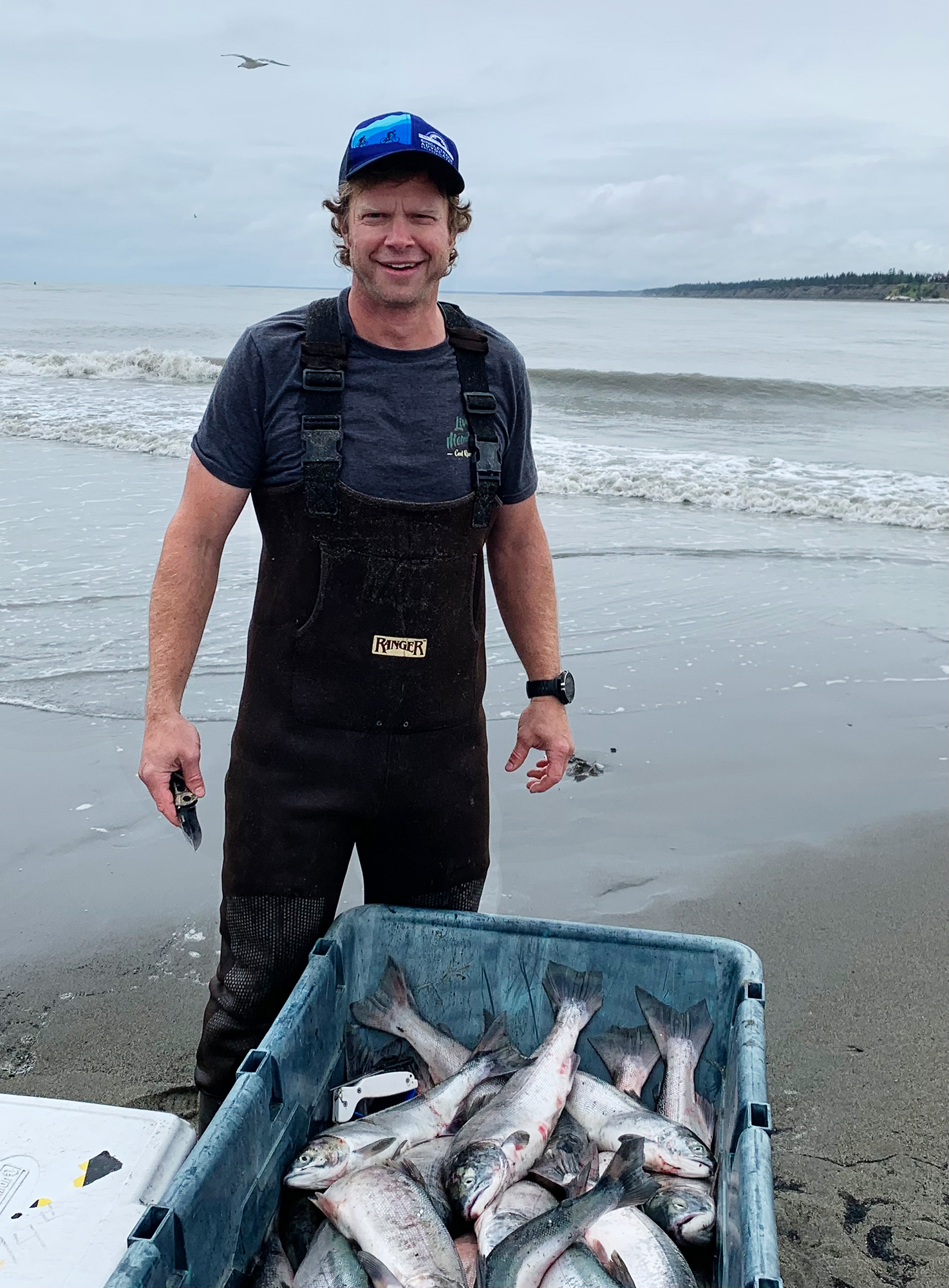 Davin Holen fishing with his son on the Kasilof River.