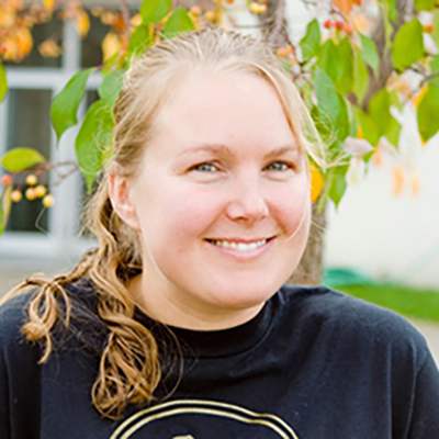 Headshot of Amanda King in front of a tree
