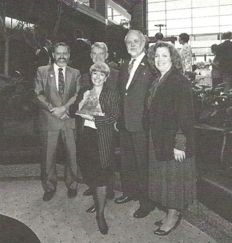 Marilyn K. Johnson, recipient of the 1990 Edith R. Bullock Prize for Excellence, with her jade award stands with (from left to right) UAA Chancellor Don Behrend, UA President Don O’Dowd, UA Foundation Trustee Brian Brundin, and UA Foundation Board President Caroline Bolar.