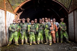 Mining students at a mine entrance