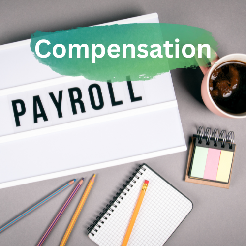 payroll sign with office supplies and a cup of coffee
