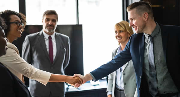 people shaking hands