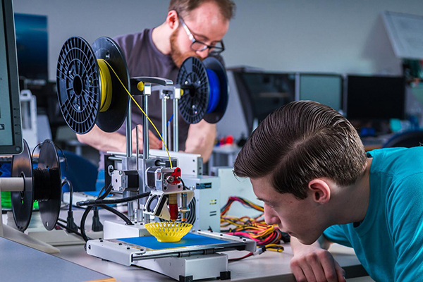 Students work in a 3D print lab