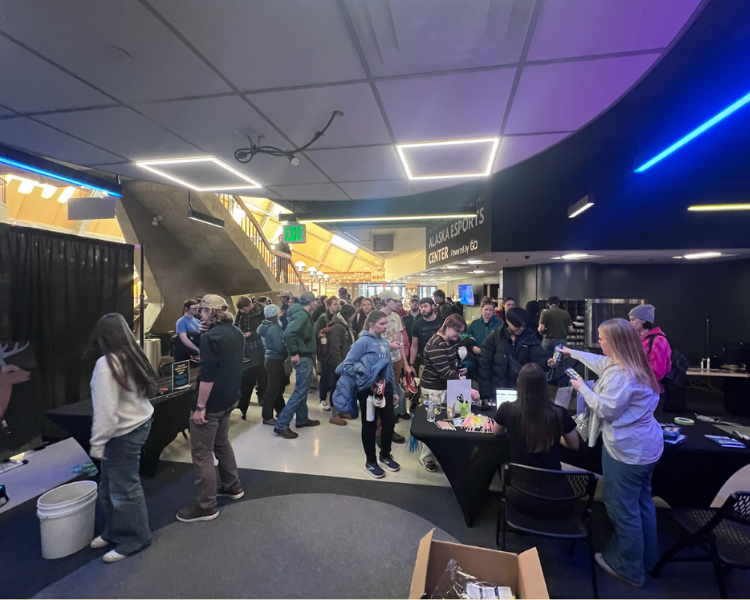 A crowd of people gathered in UAF's Wood Center to celebrate and thank the donors who were supporting them during UA Giving Day.