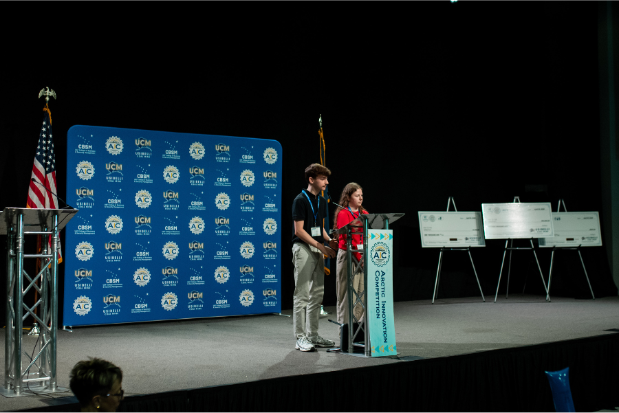 Drini and Vjosa Pellumbi present their Arctic Heat Recovery System at the 2026 UAF Arctic Innovation Competition finals at the 8 Star Events Center in Fairbanks on April 18, 2026.