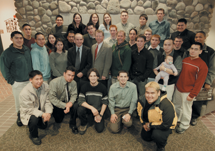 ANSEP University Success students and ANSEP Founder Dr. Herb Schroeder gathering for the 2002 ANSEP Banquet.