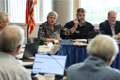 UA President Pitney speaks during a board meeting