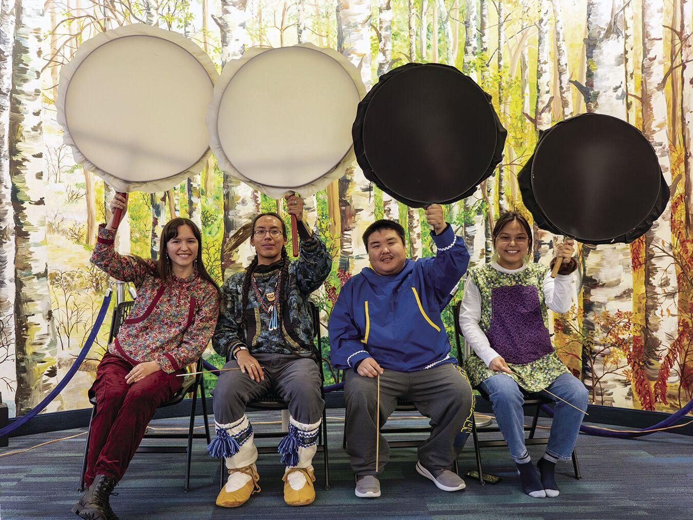 Members of the Iñu-Yupiaq Dance Group pose in the Wood Center after a workshop during the 2023 Indigenous Peoples Day, a community event hosted by the College of Indigenous Studies. From left are Alliyah Nay, Naatanii Mayo, Cavelila Wonhola and Sonni Shavings. 