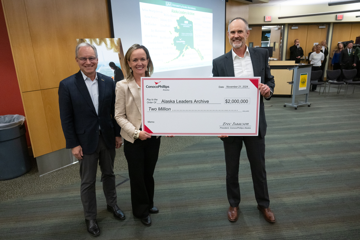 Chancellor Sean Parnell,  Lily Stevens Becker, Sen. Stevens’ daughter and executive director of the Ted Stevens Foundation, and ConocoPhillips Alaska President Erec Isaacson with a check