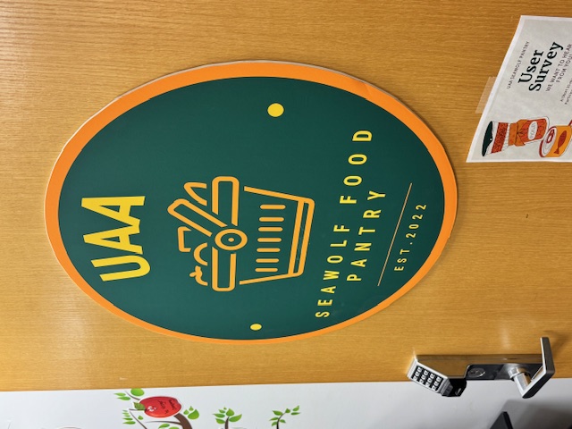 the seawolf food pantry door with logo