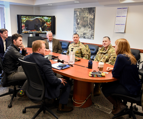 Representatives from UAF and the U.S. Army speak at an in-person meeting