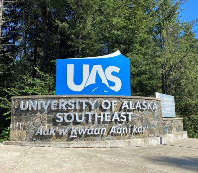 A large welcome sign reading 