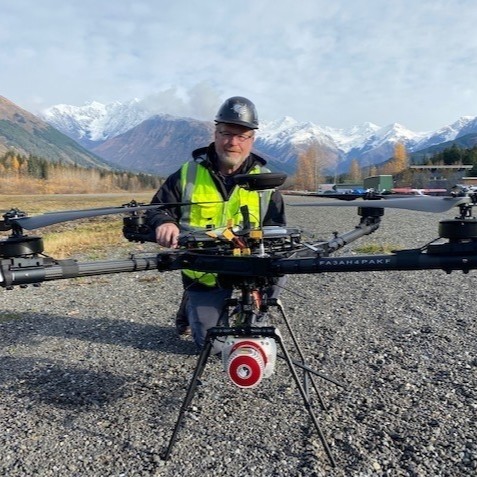 Colligan poses with a drone