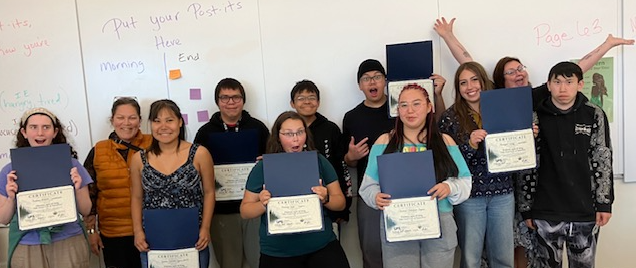 Students receive certificates of completion on the final day of the Indigenous health and healing summer intensive.