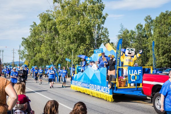 Supporters escort the UAF float