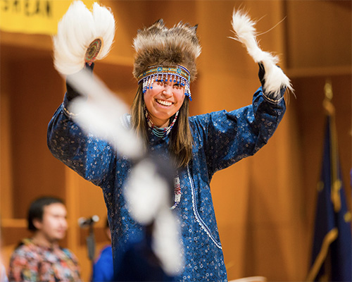 Native woman dancing