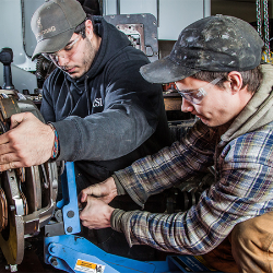 Students work on a diesel engine-thumb