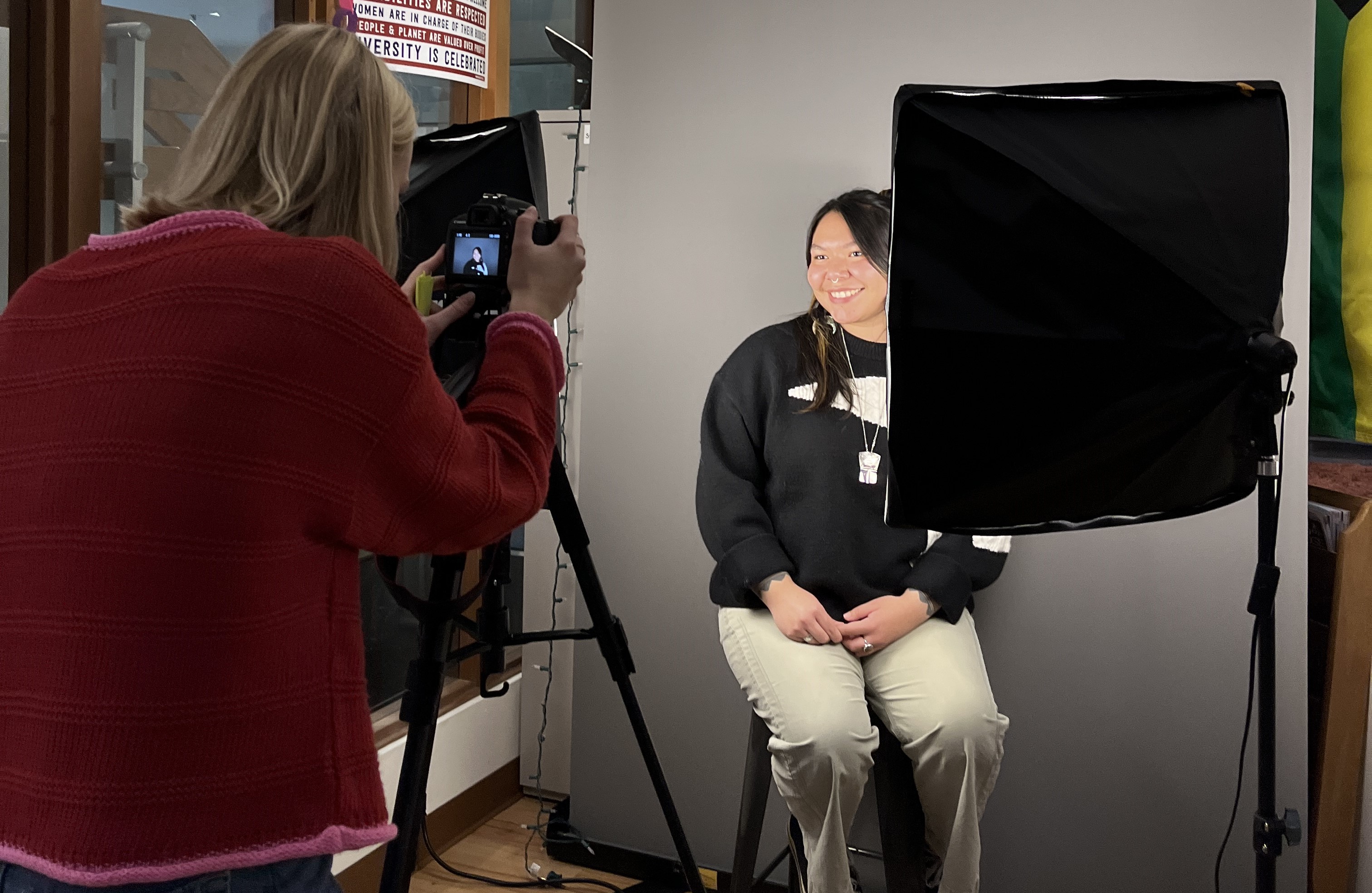 Student poses for a headshot photo