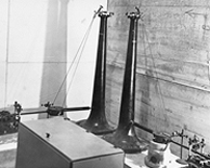 The horizontal pendulum north-south and east-west in the 1935 Seismograph Room. Photo: UAF Rasmuson Library Archives
