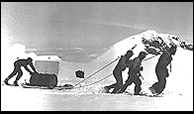 Geophysicists on top of Mt. Wrangell building a cosmic-ray observatory. They were airlifted to 9,800 feet and climbed to the summit at 14,132 feet where materials were dropped to them by the Air Force.