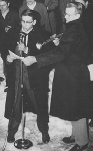 On March 22, 1957 Herman Nurnburger holds the flashlight for master of ceremonies Peter Schust. Photo: Rasmuson Library, Henry Kaiser Collection, Alaska Airlines