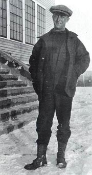 John Shanly standing outside of Old Main. Photo: Rasmuson Library, LarVern Collection