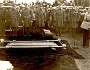 Eielson Burial with soldiers standing at attention and a soldier playing a bugle. Photo: Institute for Regional Studies, NDSU Libraries, Fargo