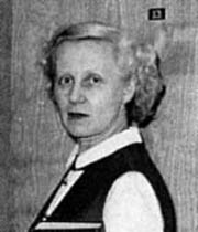 Druska Carr Schaible stands in front of her office in the Natural Science Department. Photo: University Relations Collection, Rasmuson Library