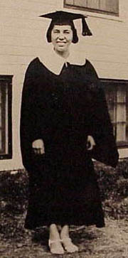 Flora Harper smiles on her graduation day at the Alaska Agricultural College and School of Mines in 1935. Photo: Interior Aleutians Campus, Harper Building