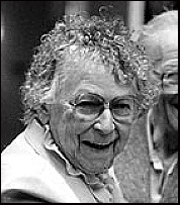 Professor emeritus Lola Tilly shares a smile with alumni during the reuion luncheon on May 10, 1986 at UAF.