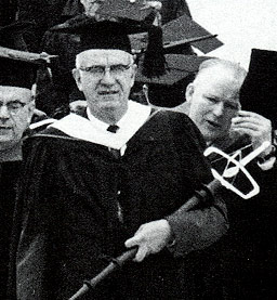 The 1976 commencement parade lead by university marshal William Cashen.