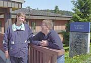 Sandy Fortmeyer (Mourant) and her son, Ryan, stand by the Mourant Building. The building is named after her first husband and Ryan's father. Photo: by Brian Wallace, Juneau Empire