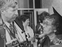 Jimmy Bedford and Emily Brown talk outside the Patty Gym after the May 11, 1980 graduation ceremony.