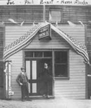 Ernst Brothers Alaska Printing Company building with Joe and Phil Ernst.